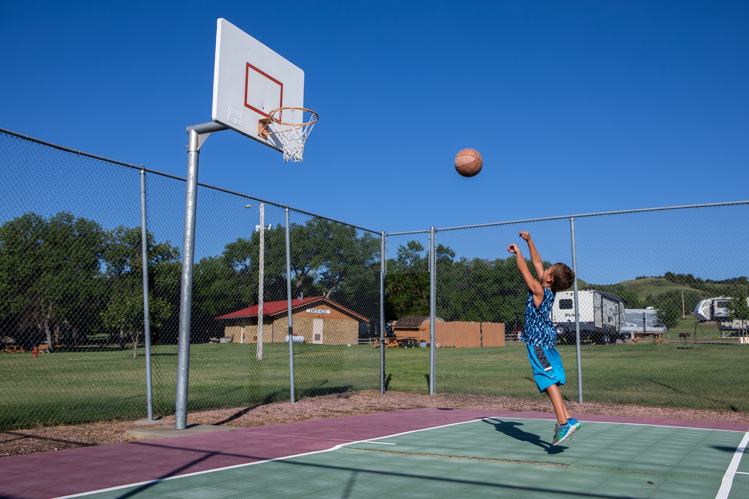 A child playing basketball.